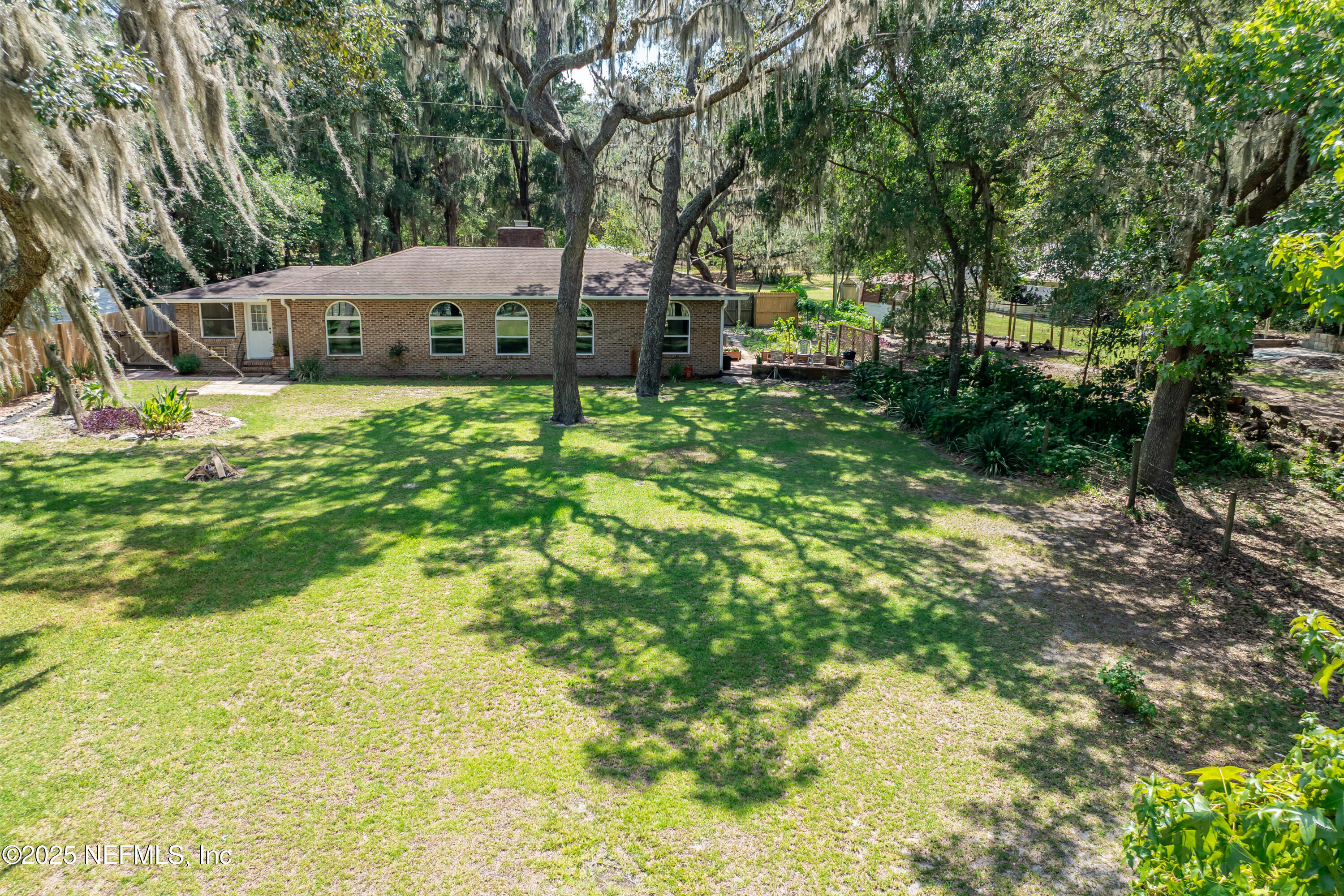 8048 County Line Road Melrose, FL 32666 - Photo 37 of 40 a view of a back yard