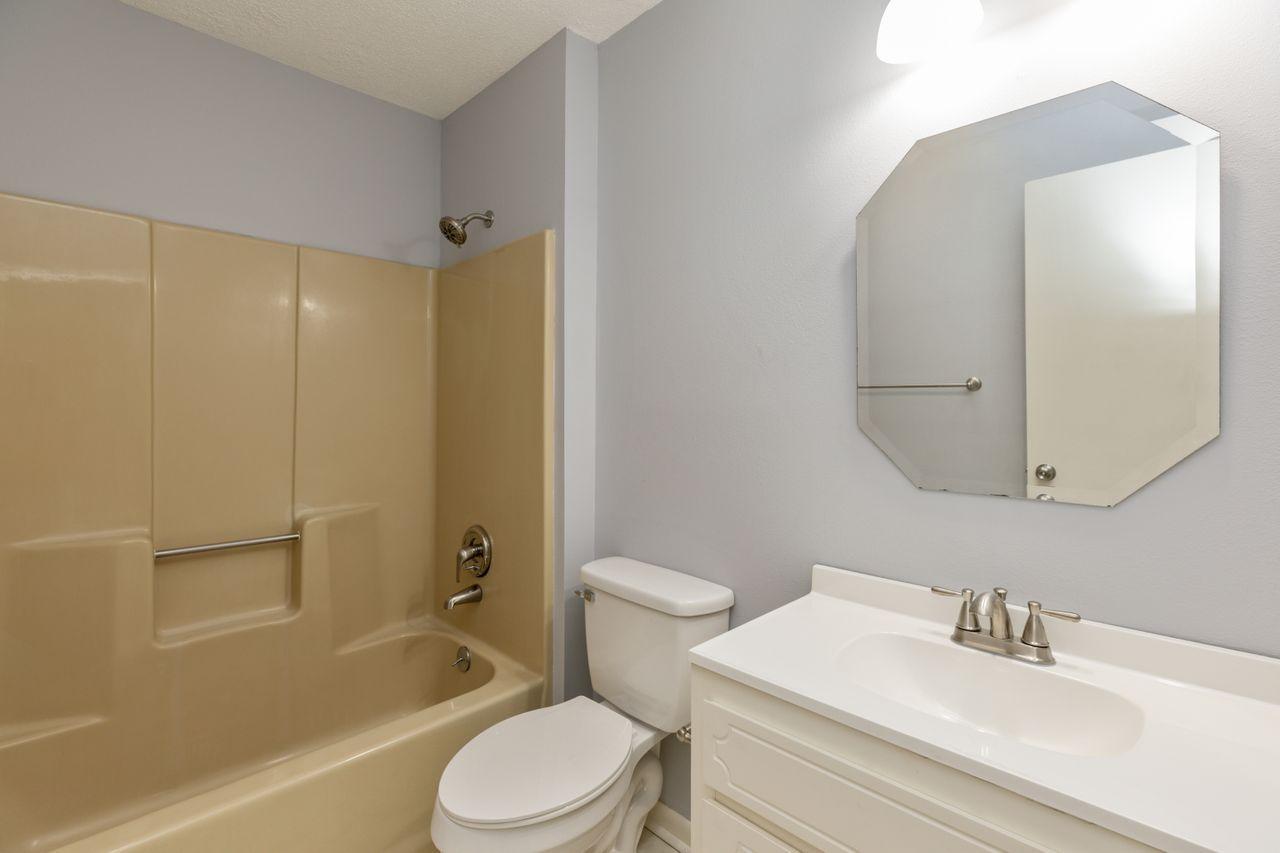6130 Beasley Road Crestview, FL 32536 - Photo 12 of 28 a bathroom with a sink a toilet and shower