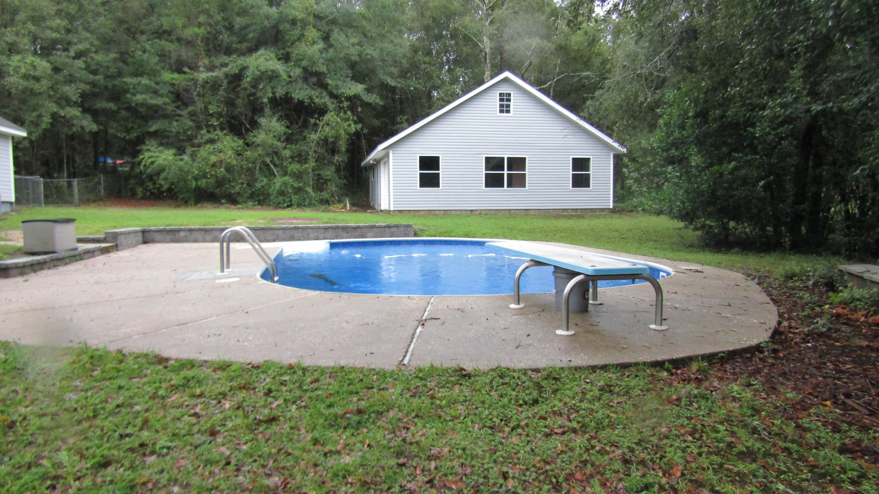 6130 Beasley Road Crestview, FL 32536 - Photo 21 of 28 a view of outdoor space yard swimming pool and lake view