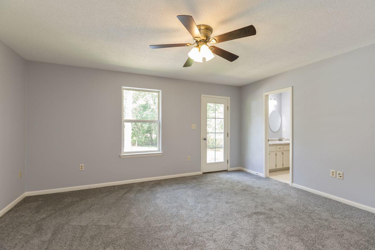 6130 Beasley Road Crestview, FL 32536 - Photo 7 of 28 a view of an empty room with a window