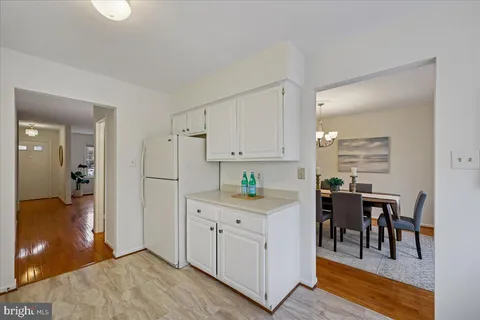 a view of a kitchen and dining room