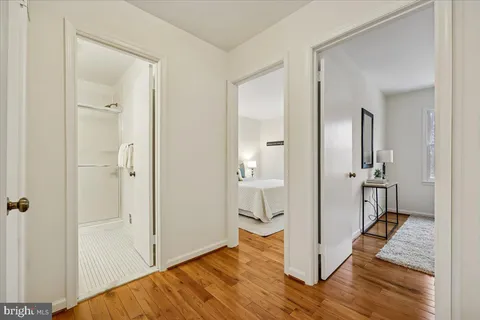 a view of a bathroom with tub and shower