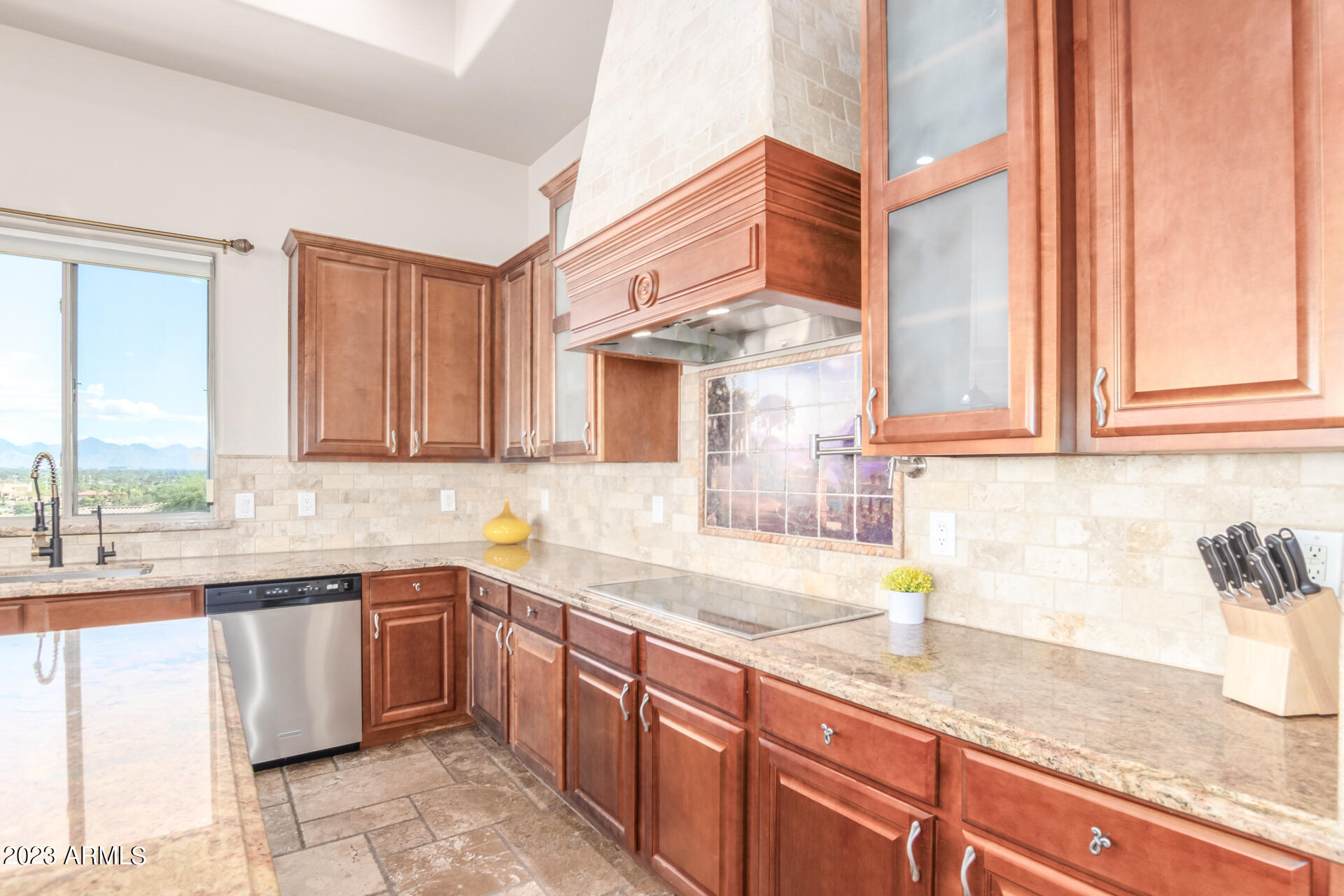 14234 North 27th Place Phoenix, AZ 85032 - Photo 16 of 66 a kitchen with a sink stove and cabinets