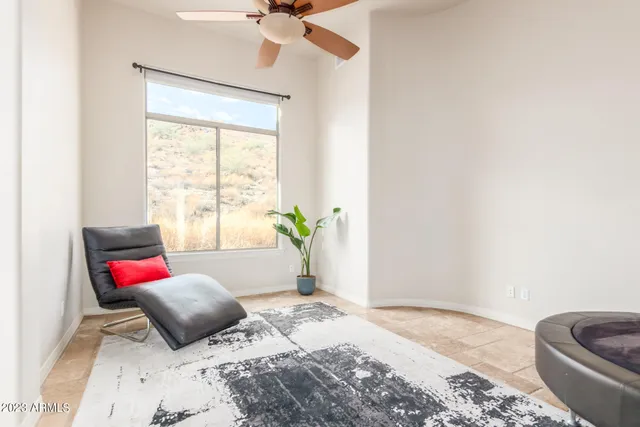 a bathroom with a granite countertop sink a mirror and a shower