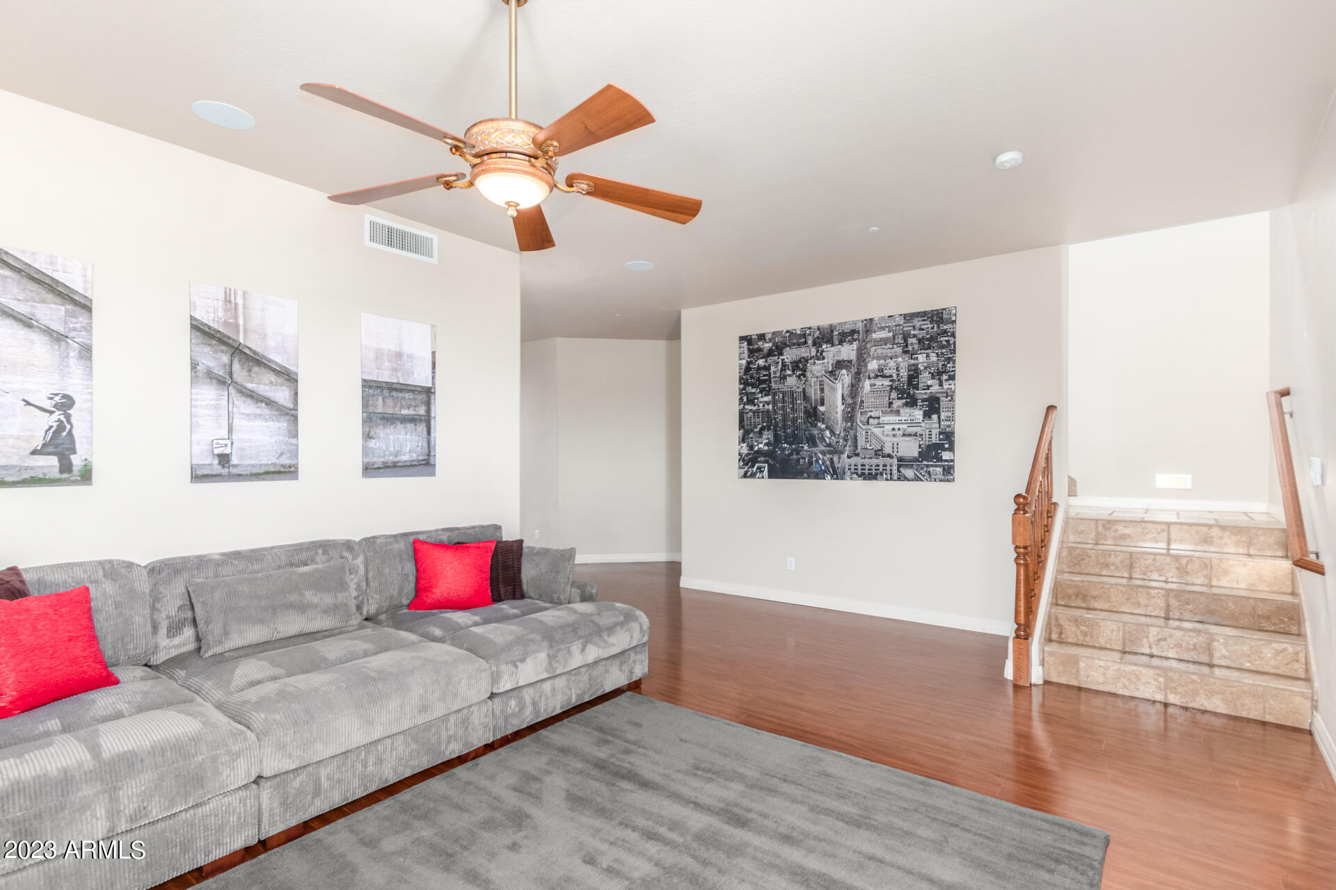 14234 North 27th Place Phoenix, AZ 85032 - Photo 38 of 66 a living room with furniture and wooden floor