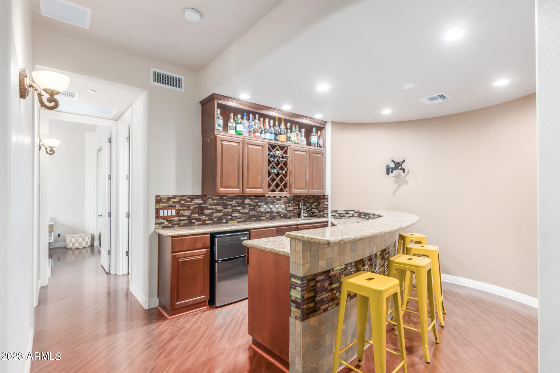 14234 North 27th Place Phoenix, AZ 85032 - Photo 41 of 66 a kitchen with a stove and cabinets