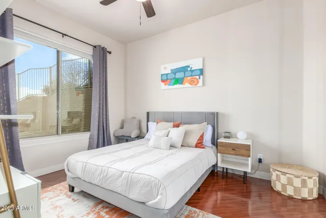 a view of a terrace with furniture and a fire pit