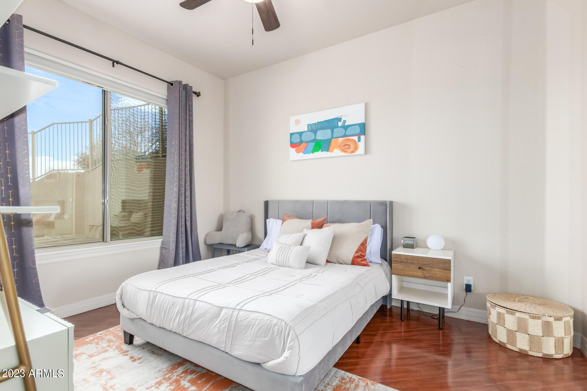 14234 North 27th Place Phoenix, AZ 85032 - Photo 44 of 66 a bedroom with a bed and a window