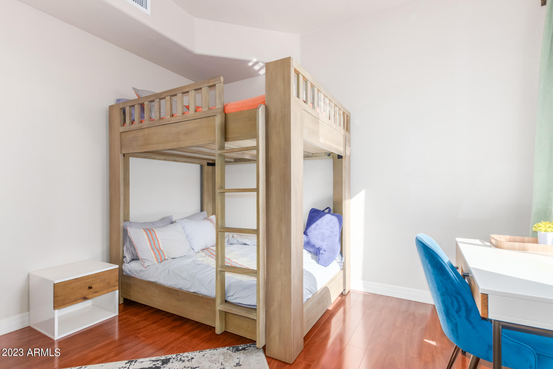 14234 North 27th Place Phoenix, AZ 85032 - Photo 47 of 66 a bedroom with a bunk bed and a desk in it