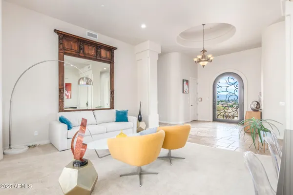 a living room with furniture and a table