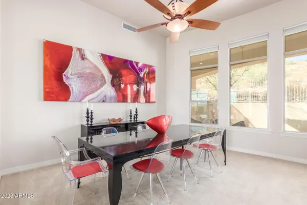 a living room with furniture fireplace and a flat screen tv
