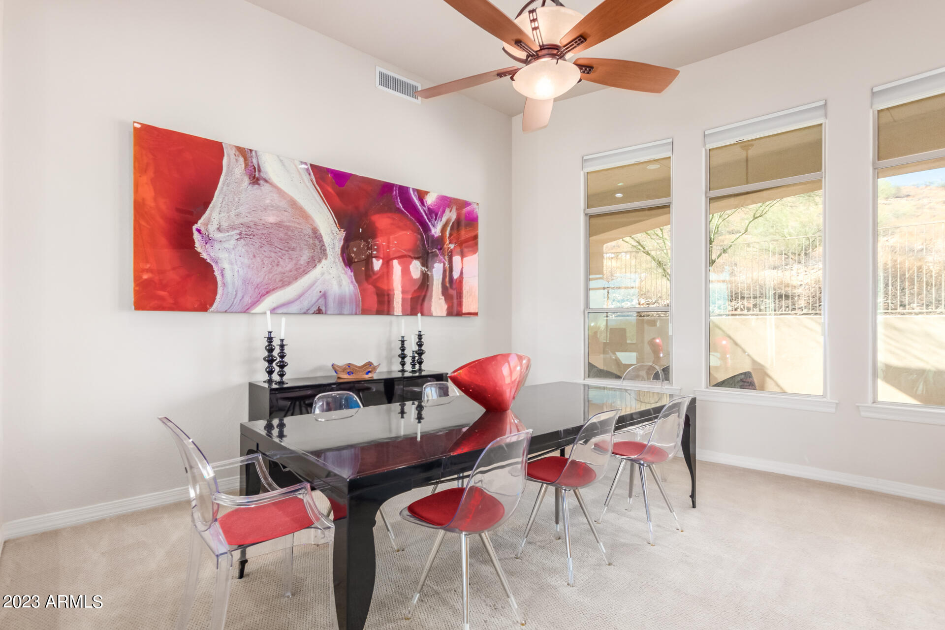 14234 North 27th Place Phoenix, AZ 85032 - Photo 8 of 66 a dining room with furniture and window