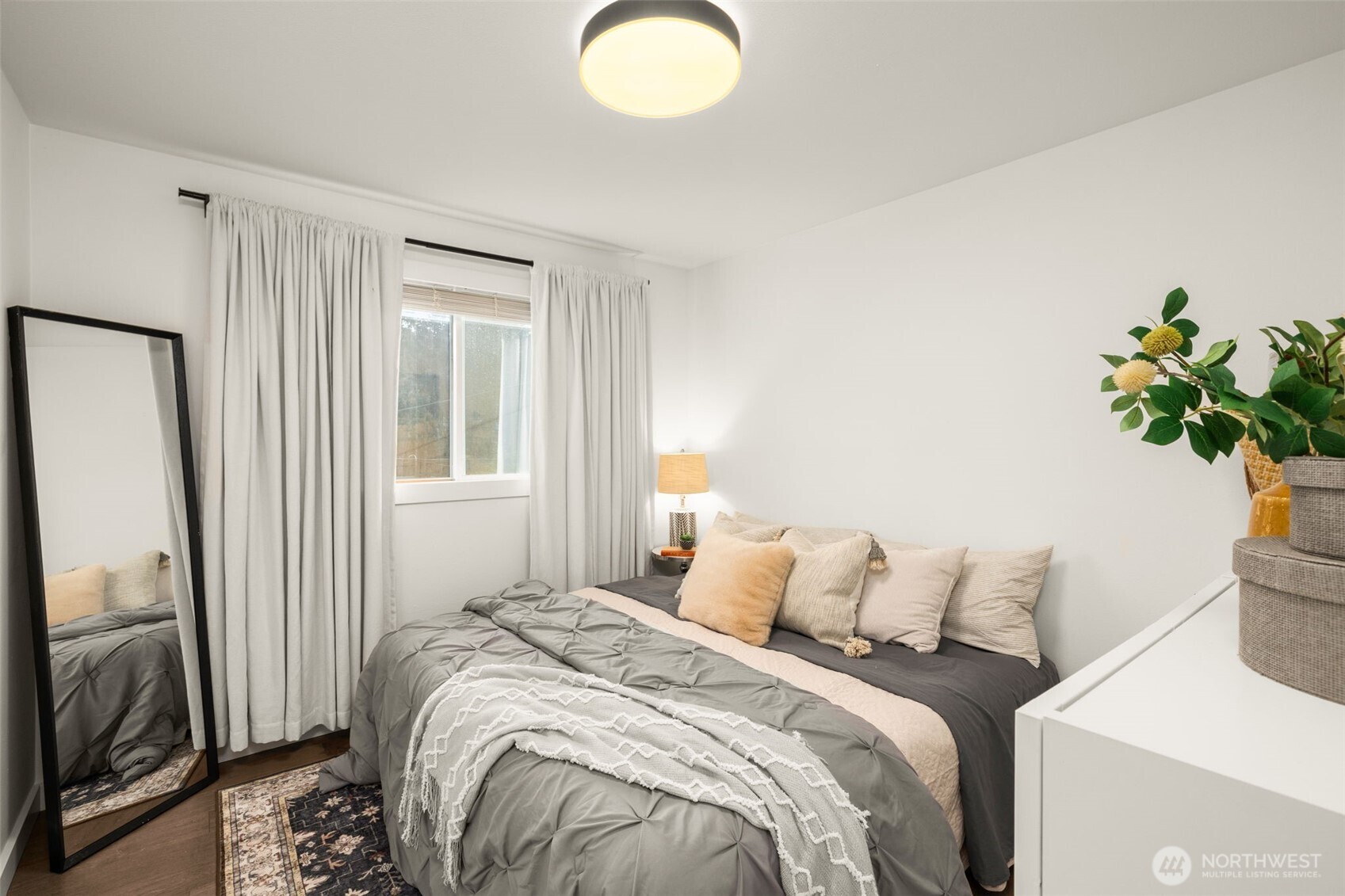 9417 235th Place Southwest Edmonds, WA 98020 - Photo 15 of 30 a bedroom with a bed and a window