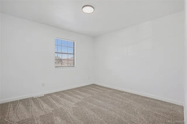 an empty room with a workbench