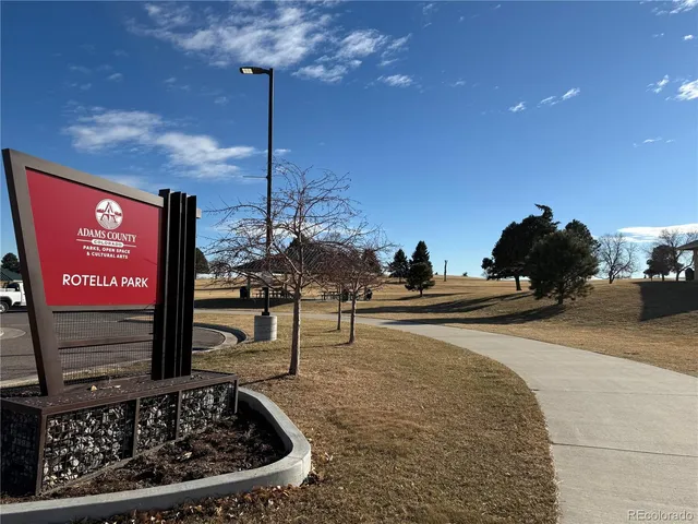 a view of a street with seating space
