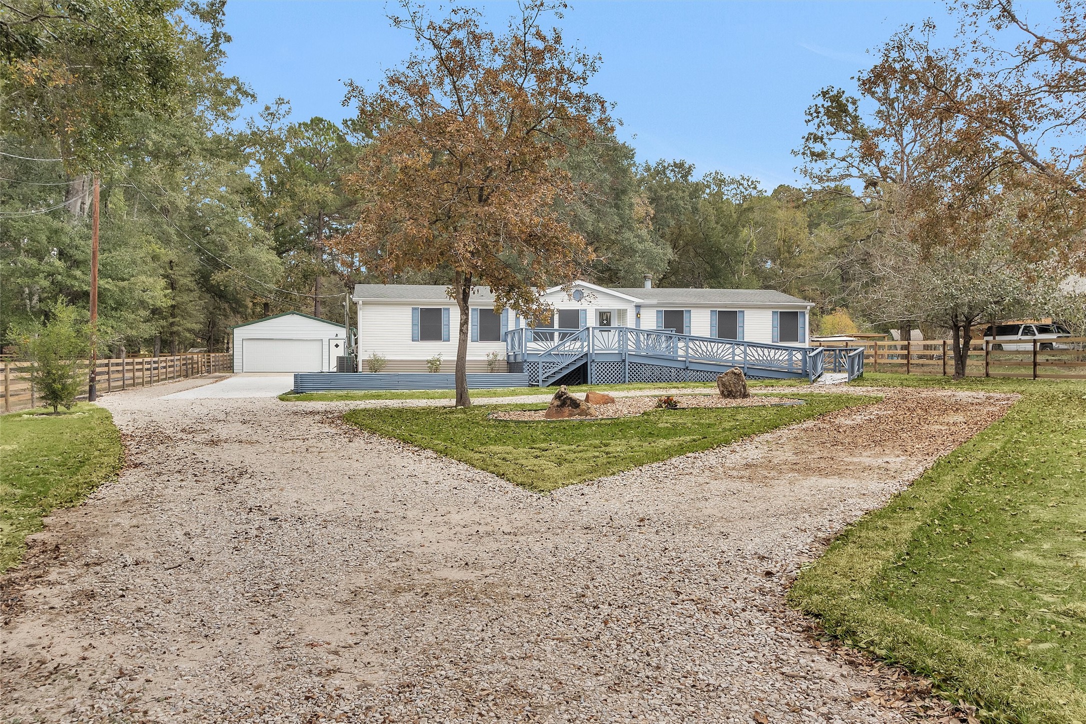 4621 Price Road Montgomery, TX 77316 - Photo 2 of 50 a view of a house with a yard and sitting area