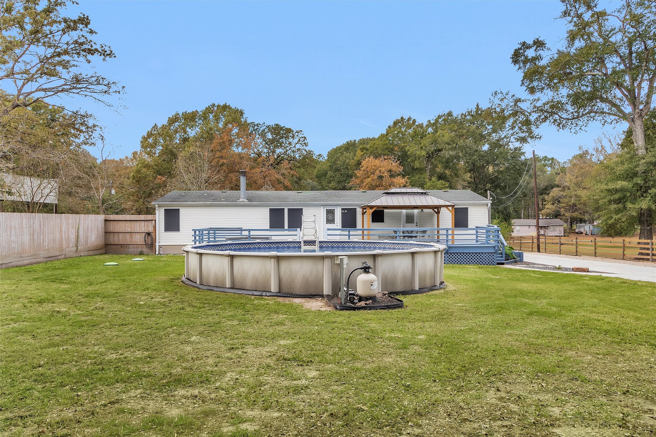 4621 Price Road Montgomery, TX 77316 - Photo 39 of 50 a front view of a house with garden