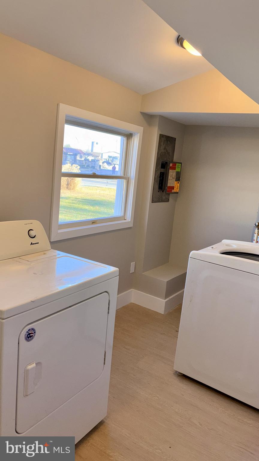 702 Federal Street Milton, DE 19968 - Photo 15 of 23 a utility room with dryer and washer