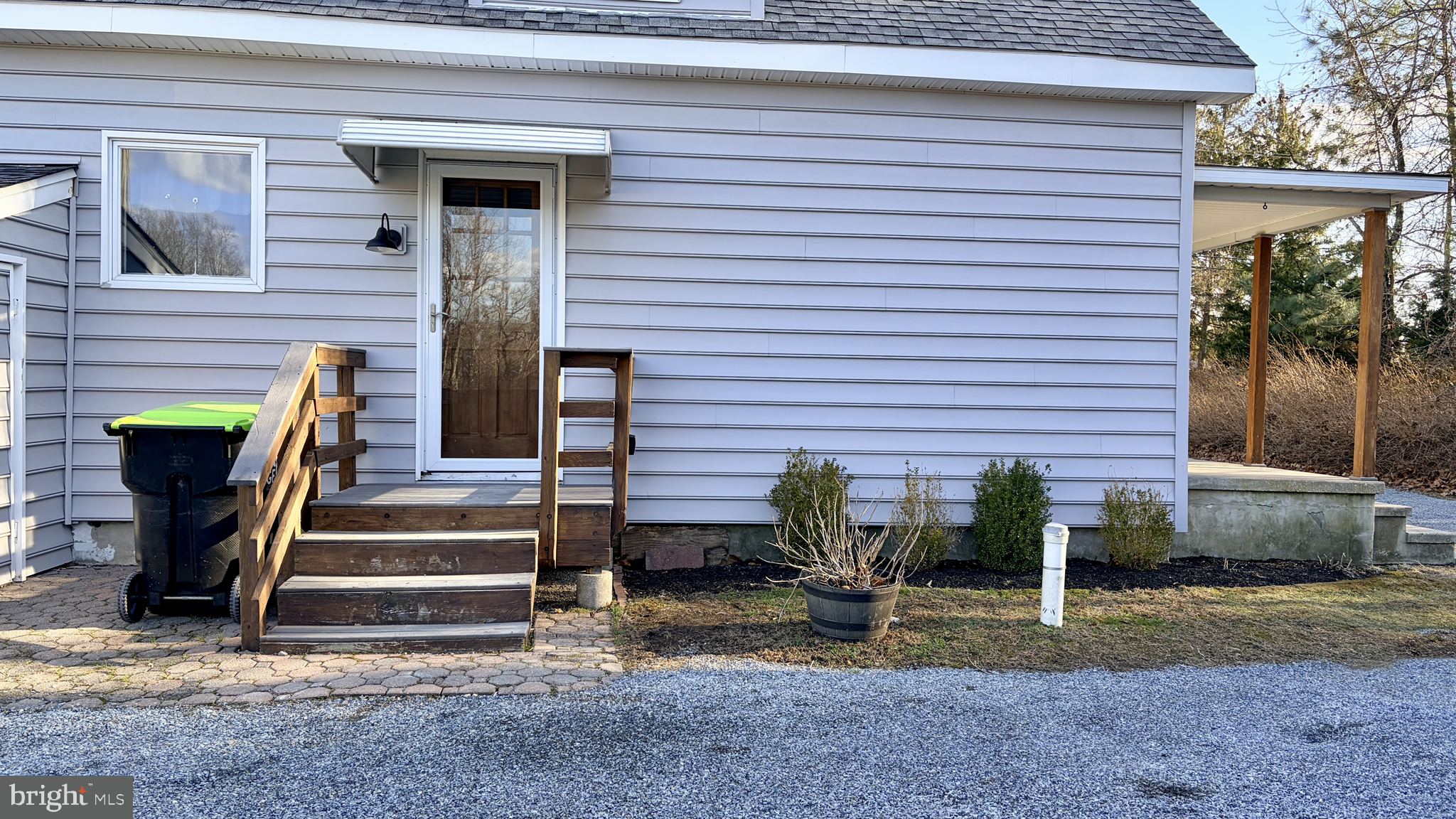 702 Federal Street Milton, DE 19968 - Photo 23 of 23 a view of a house with wooden fence