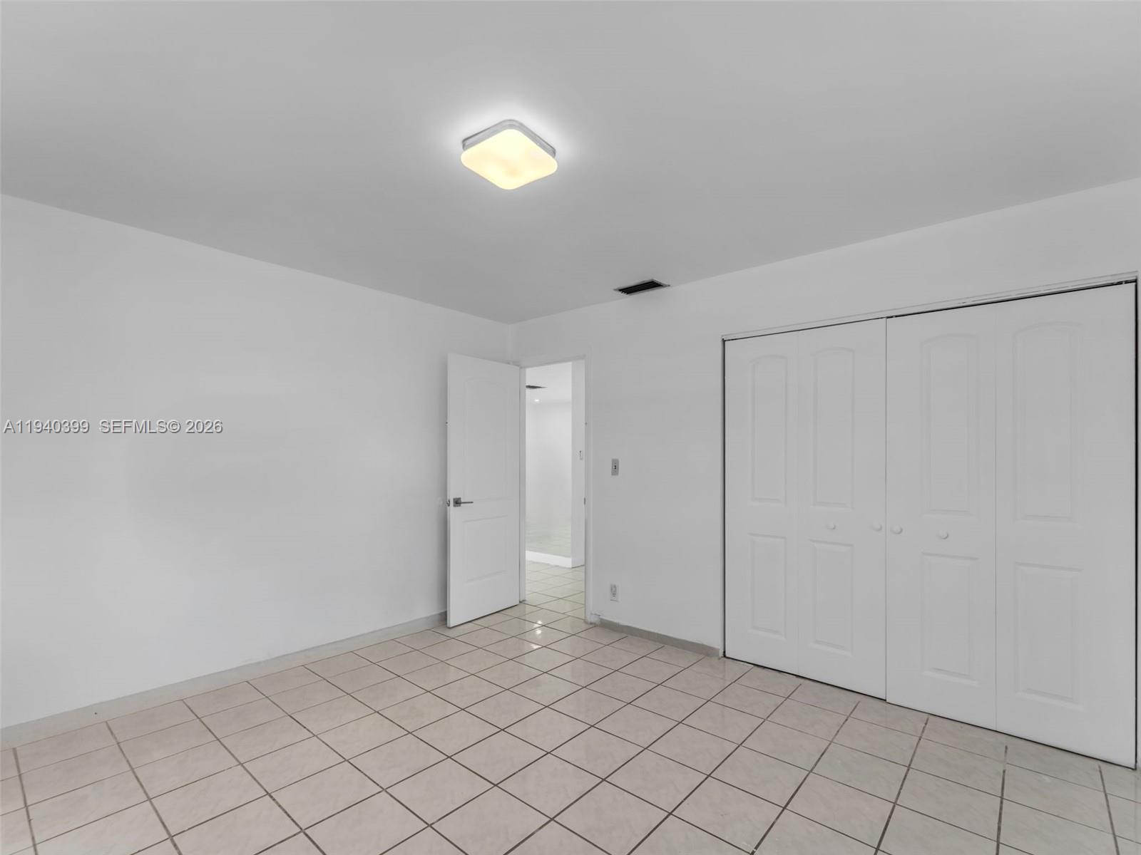 1811 Southwest 97th Terrace, Unit 2 Miramar, FL 33025 - Photo 18 of 29 a view of an empty room