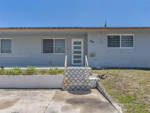 a house view with a garden space