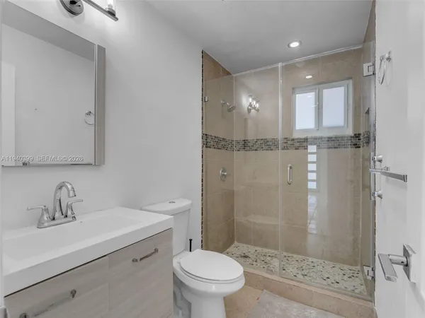 a front view of a house with a yard and outdoor space