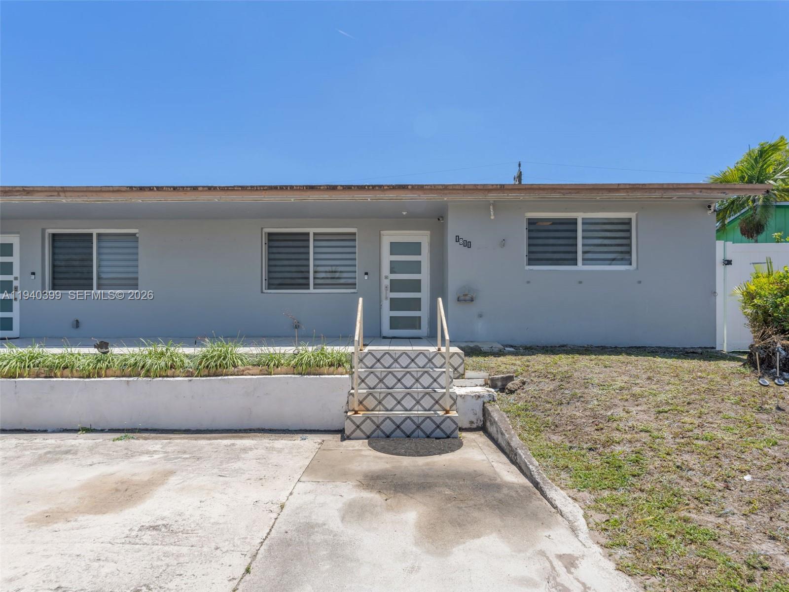 1811 Southwest 97th Terrace, Unit 2 Miramar, FL 33025 - Photo 28 of 29 a front view of a house