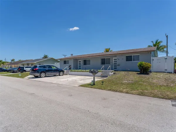 a view of house with patio