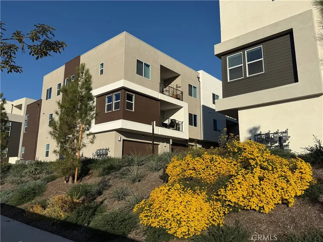 a house view with a outdoor space
