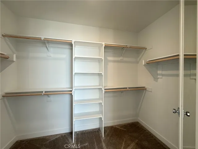 a storage room with wooden floor