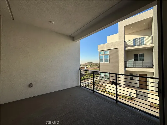 a large kitchen with stainless steel appliances lots of counter top space