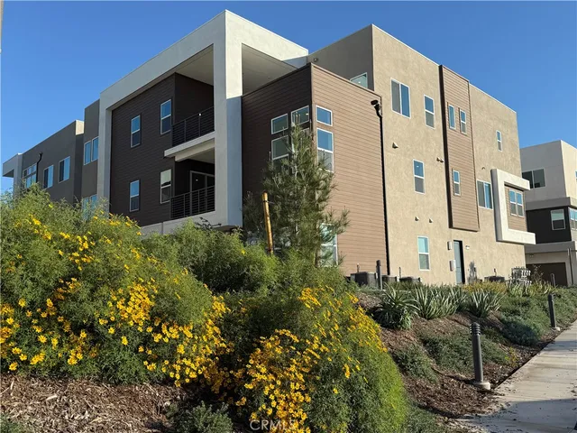 a view of a building with a garden