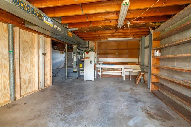 a view of backyard of house with outdoor seating