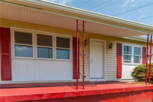 front view of a house with a big yard