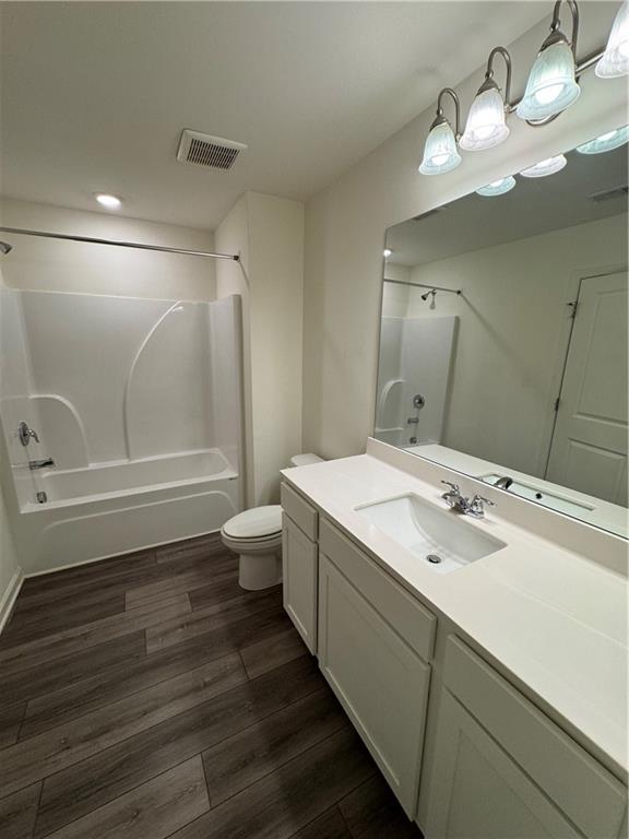 310 Penn Sta Way Cartersville, GA 30120 - Photo 5 of 10 a bathroom with a double vanity sink mirror and toilet