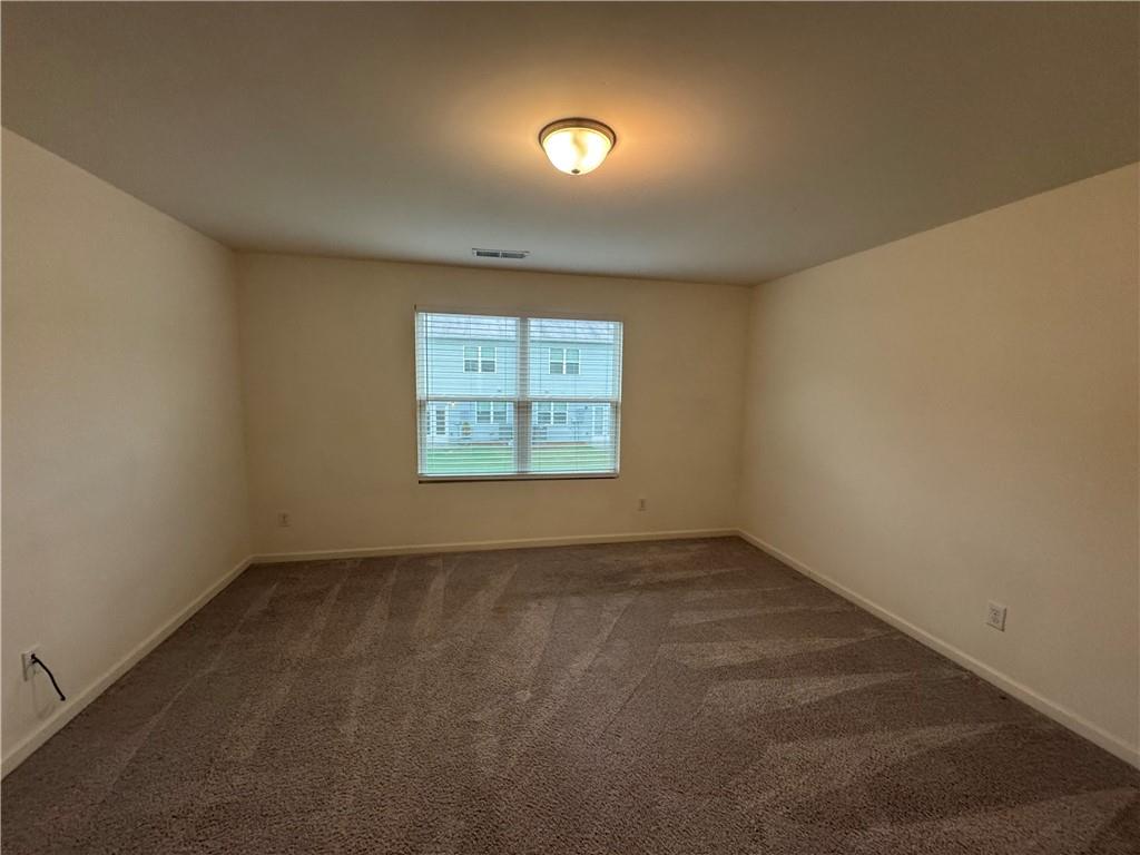 310 Penn Sta Way Cartersville, GA 30120 - Photo 6 of 10 an empty room with windows