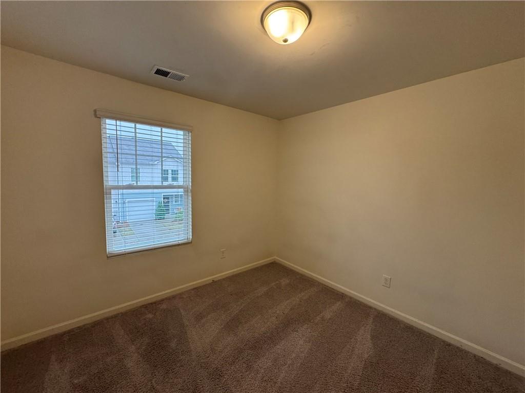 310 Penn Sta Way Cartersville, GA 30120 - Photo 8 of 10 an empty room with a window