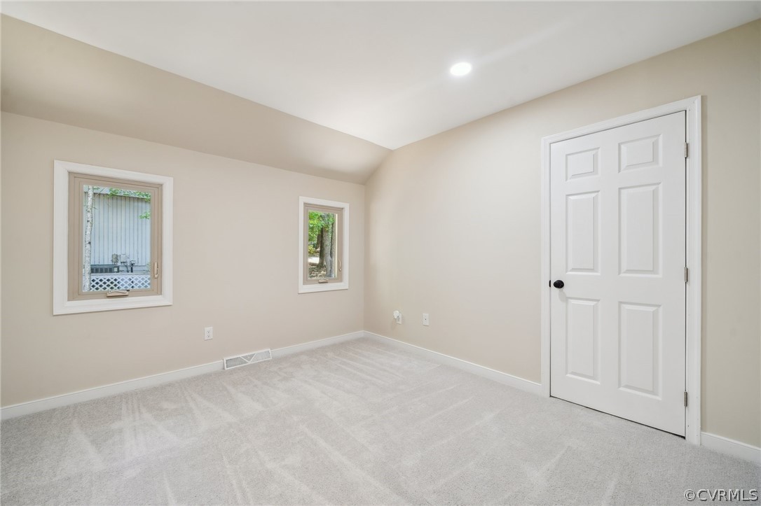 13914 Barnes Spring Road Midlothian, VA 23112 - Photo 17 of 33 an empty room with windows and closet