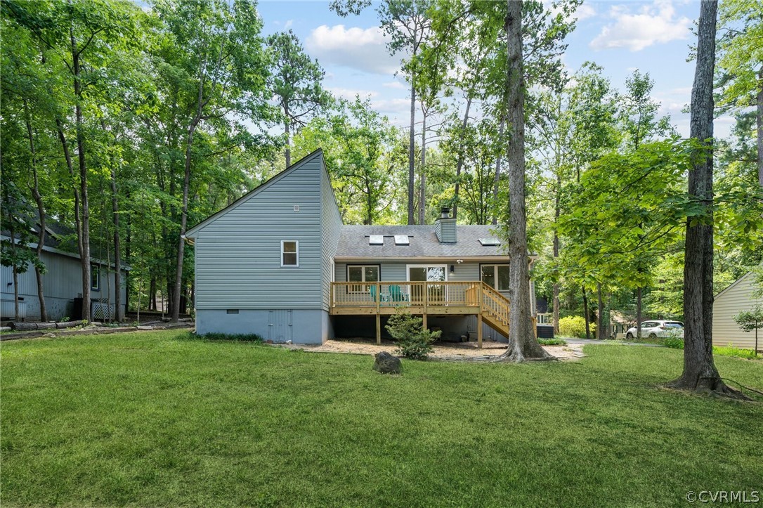 13914 Barnes Spring Road Midlothian, VA 23112 - Photo 25 of 33 a view of a house with backyard and a tree