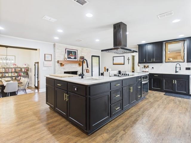 902 Ward Lane Athens, TX 75751 - Photo 11 of 40 a kitchen with kitchen island granite countertop a sink counter top space and stainless steel appliances