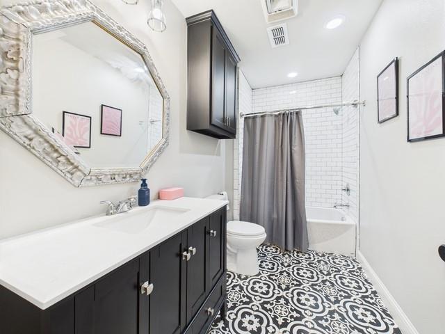 902 Ward Lane Athens, TX 75751 - Photo 16 of 40 a bathroom with a sink a toilet and shower