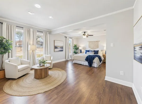 a view of livingroom with hardwood floor and hallway