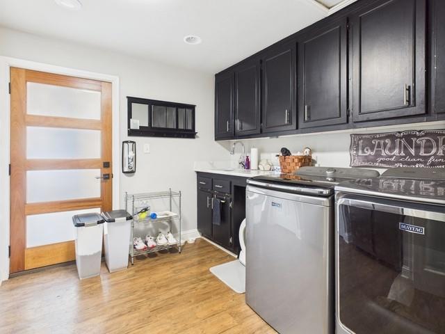 902 Ward Lane Athens, TX 75751 - Photo 17 of 40 a kitchen with stainless steel appliances a stove a sink and cabinets
