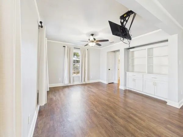 a view of entryway with stairs and wooden floor