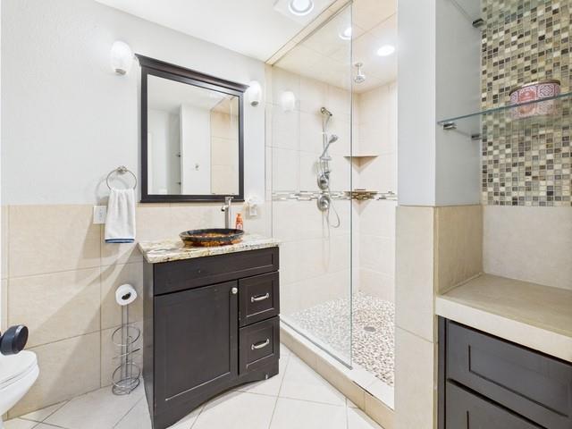 902 Ward Lane Athens, TX 75751 - Photo 19 of 40 a bathroom with a sink and a mirror