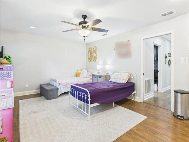 902 Ward Lane Athens, TX 75751 - Photo 21 of 40 a living room with furniture and a wooden floor