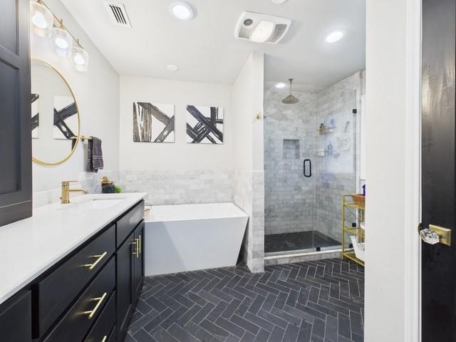 902 Ward Lane Athens, TX 75751 - Photo 26 of 40 a bathroom with a sink a toilet a mirror and shower