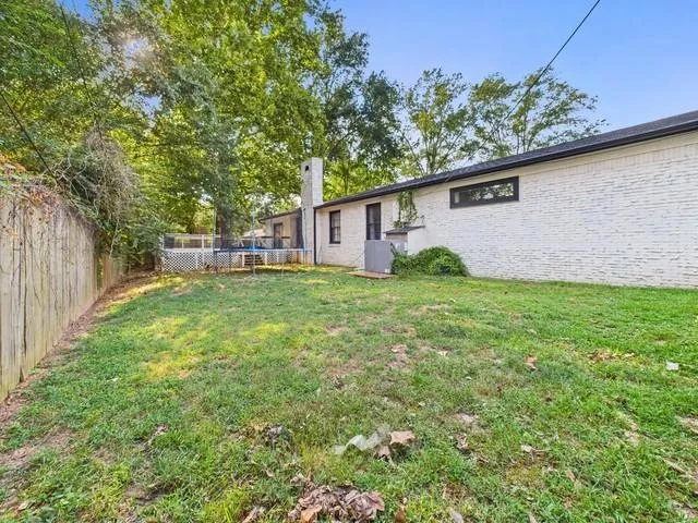 a view of back yard of the house
