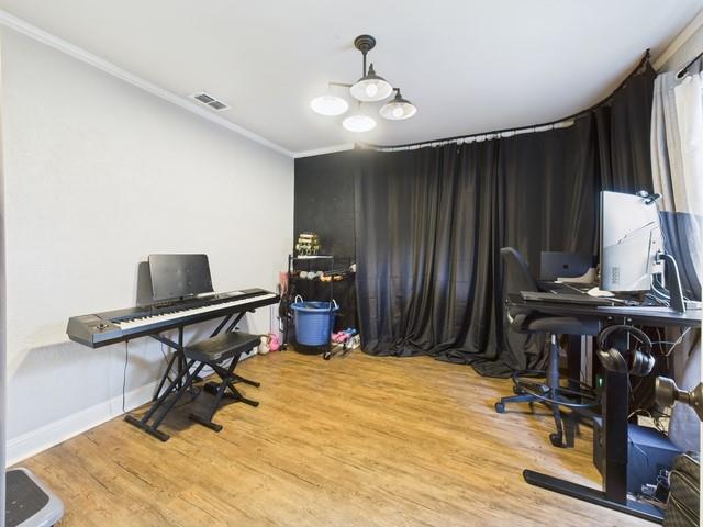 902 Ward Lane Athens, TX 75751 - Photo 7 of 40 a room with gym equipment and view of living room