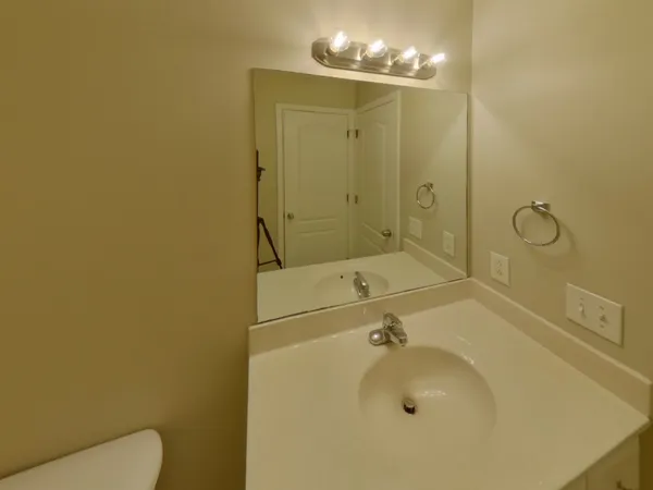 a bathroom with a shower and toilet